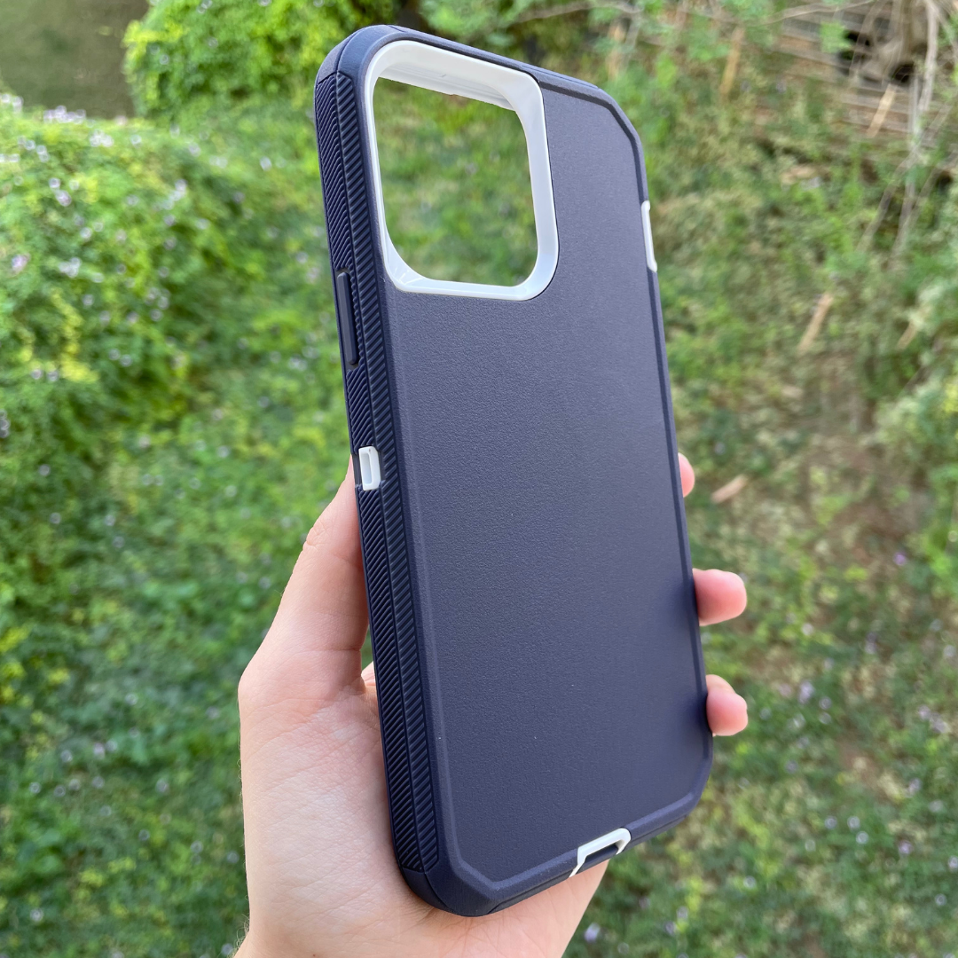 hand holding iPhone protective case navy and white color