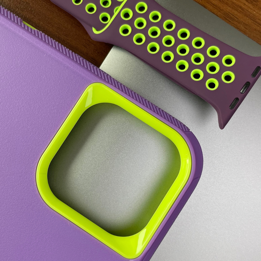 iPhone protective case light purple green near a silicone purple and green watchband